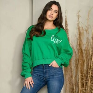 81. WOMEN'S OVERSIZED RUCHED LONG SLEEVE GRAPHIC SWEATSHIRT